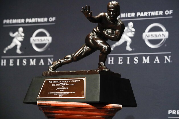 The Heisman Trophy on display during a press conference after the Heisman Trophy ceremony, Saturday, Dec. 14, 2019, in New York. (AP Photo/Jason Szenes)