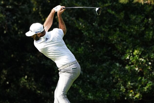 Dustin Johnson winds up to tee off on the seventh hole during the third round of the Masters golf tournament Saturday, Nov. 14, 2020, in Augusta, Ga. (AP Photo/Matt Slocum)