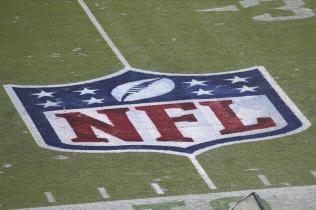 The NFL logo is seen on the field before an NFL football game between the Jacksonville Jaguars and the Houston Texans, Sunday, Nov. 8, 2020, in Jacksonville, Fla. (AP Photo/Stephen B. Morton)