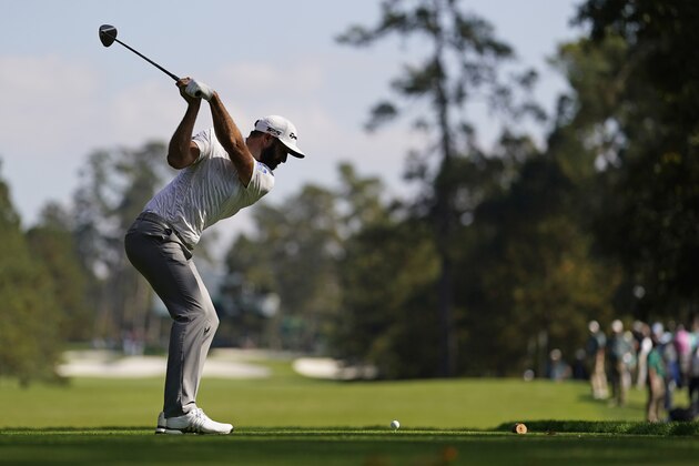 Dustin Johnson tees off on the seventh hole during the third round of the Masters golf tournament Saturday, Nov. 14, 2020, in Augusta, Ga. (AP Photo/David J. Phillip)