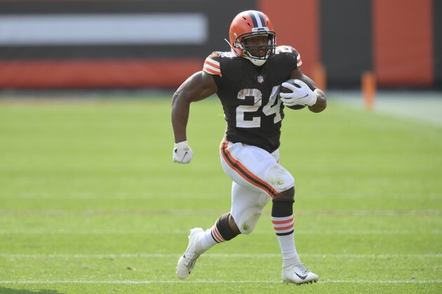 Cleveland Browns running back Nick Chubb (24) runs with the ball in the fourth quarter of an NFL football game against the Washington Football Team, Sunday, Sept. 27, 2020, in Cleveland. The Browns won 34-20. (AP Photo/David Richard)