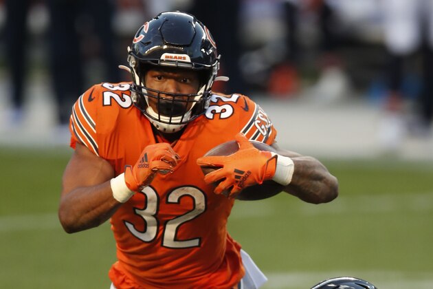 Chicago Bears running back David Montgomery (32) runs with the ball against the Indianapolis Colts during an NFL football game, Sunday, Oct. 4, 2020, in Chicago. The Colts won the game 19-11. (Jeff Haynes/AP Images for Panini)