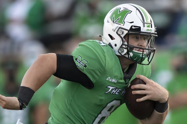 Marshall Thundering Herd quarterback Grant Wells (8) runs the ball during an NCAA football game against the Appalachian State Mountaineers on Saturday, Sept. 19, 2020 in Huntington, W.VA. (AP Photo/Emilee Chinn)