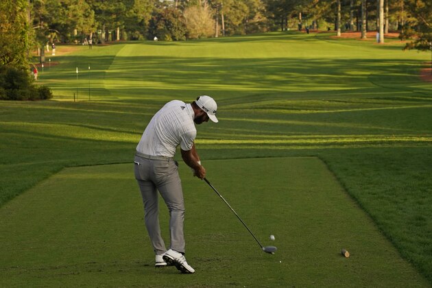 Dustin Johnson tees off on the 17th hole during the third round of the Masters golf tournament Saturday, Nov. 14, 2020, in Augusta, Ga. (AP Photo/Charlie Riedel)