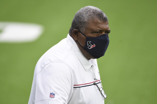 Houston Texans interim head coach Romeo Crennel walks on the field during an NFL football game against the Green Bay Packers Sunday, Oct. 25, 2020, in Houston. (AP Photo/Eric Christian Smith)
