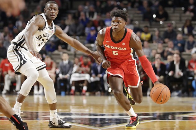 Georgia guard Anthony Edwards (5) drives against Vanderbilt guard Maxwell Evans (3) in the first half of an NCAA college basketball game Saturday, Feb. 22, 2020, in Nashville, Tenn. (AP Photo/Mark Humphrey)