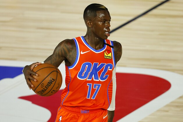 Oklahoma City Thunder's Dennis Schroder handles the ball during the first quarter of an NBA basketball game against the Los Angeles Clippers, Friday, Aug. 14, 2020, in Lake Buena Vista, Fla. (Mike Ehrmann/Pool Photo via AP)