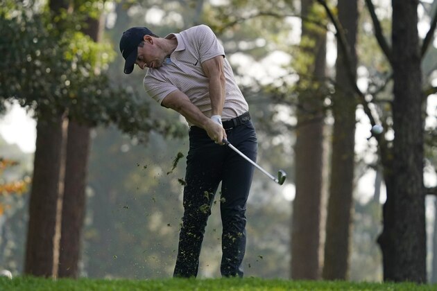 Rory McIlroy, of Northern Ireland, hits on the fourth fairway during the final round of the Masters golf tournament Sunday, Nov. 15, 2020, in Augusta, Ga. (AP Photo/Charlie Riedel)