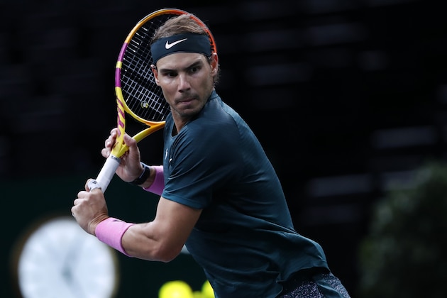 Spain's Rafael Nadal returns the ball to Germany's Alexander Zverev during their semi-final game of the Paris Masters tennis tournament in Paris, Saturday, Nov. 7, 2020. (AP Photo/Thibault Camus)