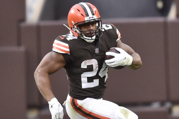 Cleveland Browns running back Nick Chubb rushes during the second half of an NFL football game against the Houston Texans, Sunday, Nov. 15, 2020, in Cleveland. (AP Photo/David Richard)