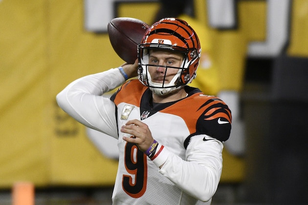 Cincinnati Bengals quarterback Joe Burrow (9) looks to throw a pass during the second half of an NFL football game against the Pittsburgh Steelers in Pittsburgh, Sunday, Nov. 15, 2020. (AP Photo/Don Wright)