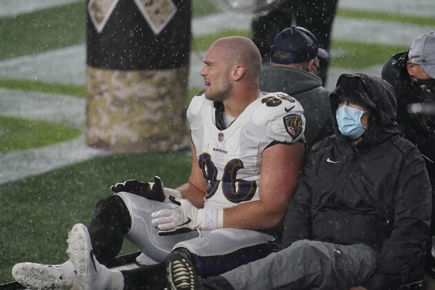 Baltimore Ravens tight end Nick Boyle leaves the field on a cart after an injury in the second half of an NFL football game against the New England Patriots, Sunday, Nov. 15, 2020, in Foxborough, Mass. (AP Photo/Charles Krupa)