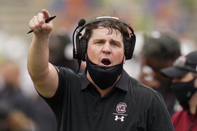 South Carolina head coach Will Muschamp has words with an official during the first half of an NCAA college football game against Florida, Saturday, Oct. 3, 2020, in Gainesville, Fla. (AP Photo/John Raoux, Pool)