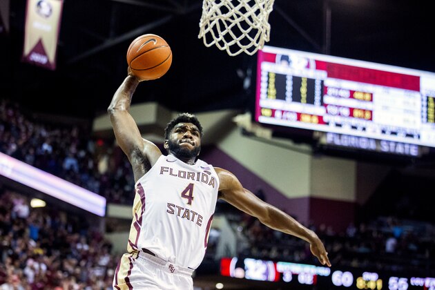 Florida State forward Patrick Williams (4) slams a dunk against Louisville in the second half of an NCAA college basketball game in Tallahassee, Fla., Monday, Feb. 24, 2020. (AP Photo/Mark Wallheiser)