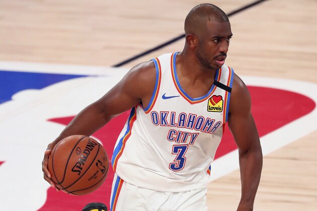 Oklahoma City Thunder guard Chris Paul (3) brings the ball upcourt against the Houston Rockets during the second half of Game 4 of an NBA basketball first-round playoff series, Monday, Aug. 24, 2020, in Lake Buena Vista, Fla. (Kim Klement/Pool Photo via AP)