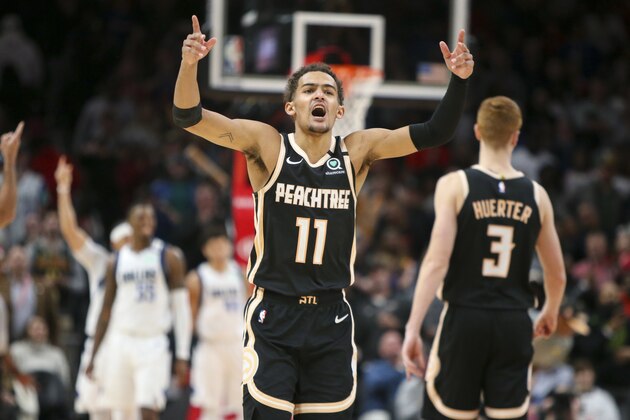 Atlanta Hawks guard Trae Young (11) shows emotion in the second half of an NBA basketball game against the Dallas Mavericks, Saturday, Feb. 22, 2020, in Atlanta. (AP Photo/Brett Davis)
