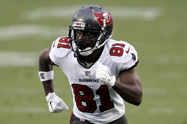 Tampa Bay Buccaneers wide receiver Antonio Brown (81) runs a route against the Carolina Panthers during the second half of an NFL football game, Sunday, Nov. 15, 2020, in Charlotte , N.C. (AP Photo/Gerry Broome)