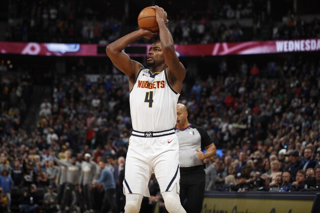 Denver Nuggets forward Paul Millsap (4) in the first half of an NBA basketball game Monday, March 9, 2020, in Denver. (AP Photo/David Zalubowski)