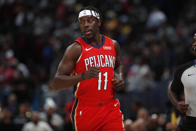 New Orleans Pelicans guard Jrue Holiday (11) in the first half of an NBA basketball game Wednesday, Dec. 25, 2019, in Denver. (AP Photo/David Zalubowski)
