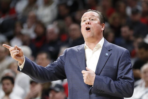Wichita State head coach Gregg Marshall works the bench in the first half of an NCAA college basketball game against Cincinnati, Sunday, Feb. 17, 2019, in Cincinnati. (AP Photo/John Minchillo)