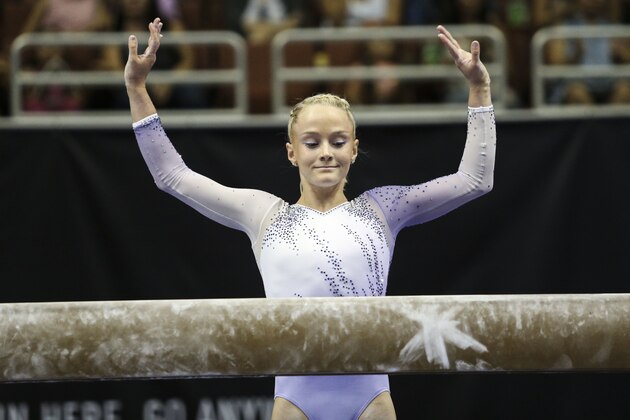 Riley McCusker competes on the balance beam during senior women's opening round of the U.S. gymnastics championships, Sunday, Aug. 20, 2017, in Anaheim, Calif. (AP Photo/Ringo H.W. Chiu)