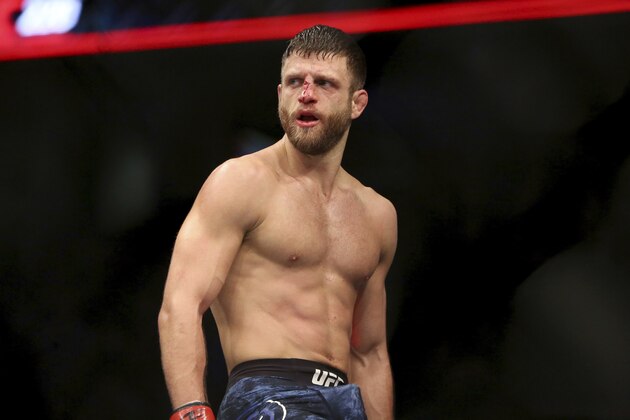 Calvin Kattar celebrates a win over Shane Burgos during a mixed martial arts bout at UFC 220, Saturday, January 20, 2018, in Boston. Kattar won via third-round TKO. (AP Photo/Gregory Payan)