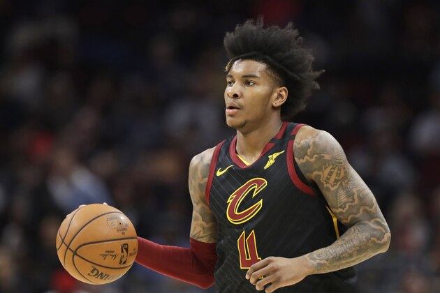 Cleveland Cavaliers' Kevin Porter Jr. drives against the Philadelphia 76ers in the first half of an NBA basketball game, Wednesday, Feb. 26, 2020, in Cleveland. (AP Photo/Tony Dejak)