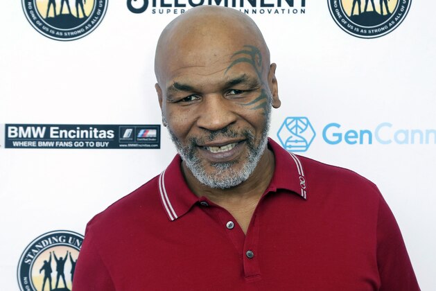 FILE - In this Aug. 2, 2019, file photo, Mike Tyson attends a celebrity golf tournament in Dana Point, Calif. Tyson and Roy Jones Jr. got permission from California's athletic commission to return to the boxing ring next month because their fight would be strictly an exhibition of their once-unparalleled skills. (Photo by Willy Sanjuan/Invision/AP, File)