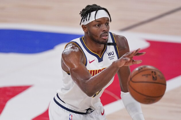 Denver Nuggets' Jerami Grant (9) plays against the Los Angeles Lakers during the first half of an NBA conference final playoff basketball game Saturday, Sept. 26, 2020, in Lake Buena Vista, Fla. (AP Photo/Mark J. Terrill)