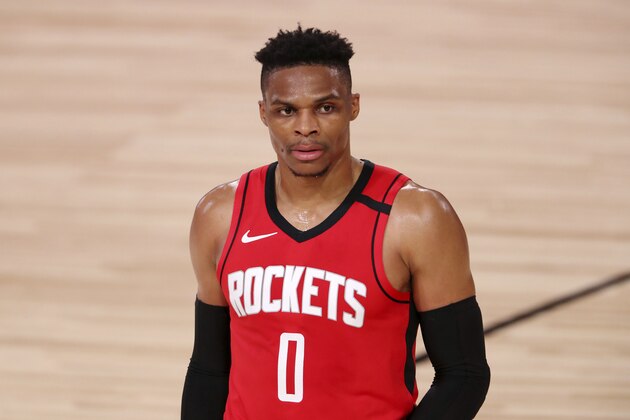 Houston Rockets Russell Westbrook (0) looks on against the Dallas Mavericks during the second half of an NBA basketball game Friday, July 31, 2020, in Lake Buena Vista, Fla. (Mike Ehrmann/Pool Photo via AP)