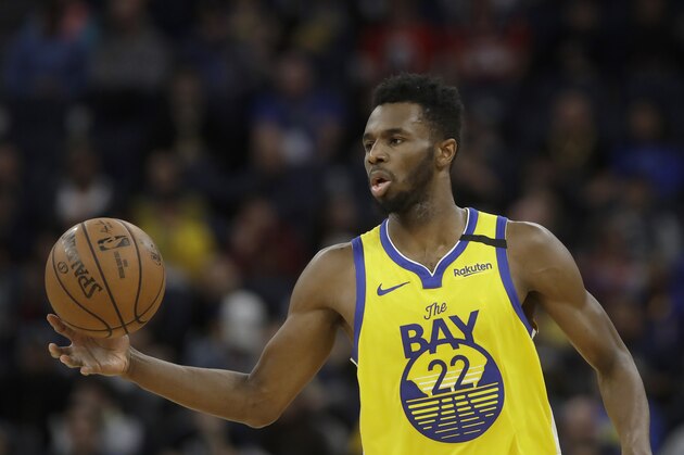 Golden State Warriors guard Andrew Wiggins (22) against the Washington Wizards during an NBA basketball game in San Francisco, Sunday, March 1, 2020. (AP Photo/Jeff Chiu)