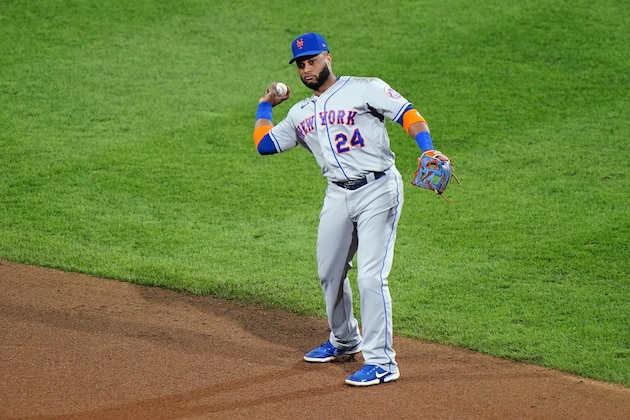 New York Mets second baseman Robinson Cano throws to first after fielding a ground out by Philadelphia Phillies' Didi Gregorius during the fourth inning of a baseball game, Tuesday, Sept. 15, 2020, in Philadelphia. (AP Photo/Matt Slocum)