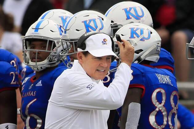 FILE - Kansas head coach Les Miles works the sidelines during the first half of an NCAA college football game against West Virginia in Lawrence, Kan., Saturday, Sept. 21, 2019. Coastal Carolina will visit the Jayhawks on Saturday night, Sept. 21, 2020, in the season opener for both teams. It's the lone non-conference game for Kansas, which will have a week off before visiting Baylor to open its nine-game Big 12 slate â€” on the date that Coastal Carolina was originally supposed to face the Jayhawks at home. (AP Photo/Orlin Wagner, File)