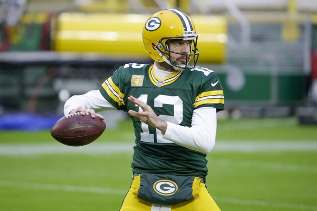 Green Bay Packers' Aaron Rodgers warms up before an NFL football game against the Jacksonville Jaguars Sunday, Nov. 15, 2020, in Green Bay, Wis. (AP Photo/Mike Roemer)