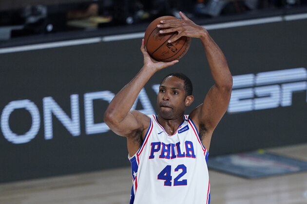 Philadelphia 76ers' Al Horford (42) shoots against the Houston Rockets during the second half of an NBA basketball game Friday, Aug. 14, 2020, in Lake Buena Vista, Fla. (AP Photo/Ashley Landis, Pool)