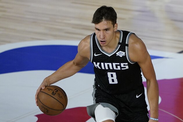 Sacramento Kings' Bogdan Bogdanovic (8) makes his way down the court during an NBA basketball game against the New Orleans Pelicans Thursday, Aug. 6, 2020, in Lake Buena Vista, Fla. (AP Photo/Ashley Landis, Pool)