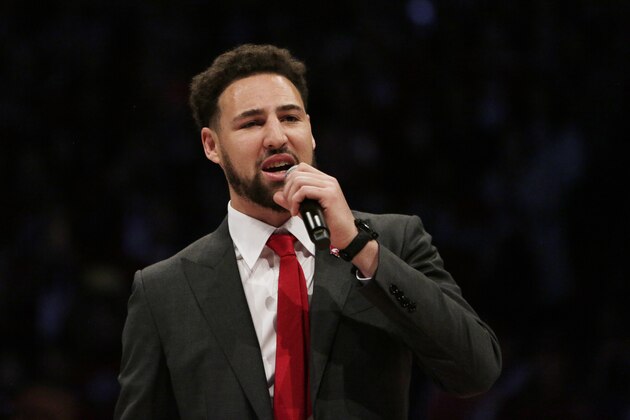 Golden State Warriors and former Washington State guard Klay Thompson speaks as the school retires his jersey number during halftime of an NCAA college basketball game between Washington State and Oregon State in Pullman, Wash., Saturday, Jan. 18, 2020. (AP Photo/Young Kwak)
