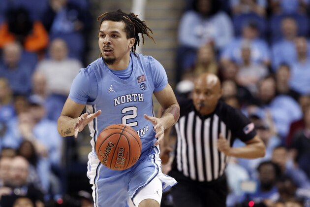 FILE - In this March 11, 2020, file photo, North Carolina guard Cole Anthony (2) dribbles against Syracuse during the first half of an NCAA college basketball game at the Atlantic Coast Conference tournament in Greensboro, N.C. Anthony is considered a first-round prospect and one of the top point guards in the NBA draft on Nov. 18. (AP Photo/Ben McKeown, File)