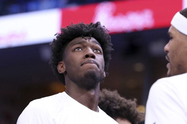 FILE - In this Tuesday, Dec. 3, 2019, file photo, Memphis' James Wiseman pauses during a timeout in the second half of an NCAA college basketball game against Bradley, in Memphis, Tenn. Wiseman is the headliner of the big men in the NBA draft on Wednesday, Nov. 18, 2020, and is expected to go in the top three picks. (AP Photo/Karen Pulfer Focht, File)