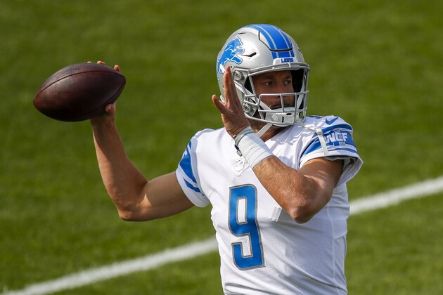 Detroit Lions' Matthew Stafford warms up before an NFL football game against the Green Bay Packers Sunday, Sept. 20, 2020, in Green Bay, Wis. (AP Photo/Matt Ludtke)