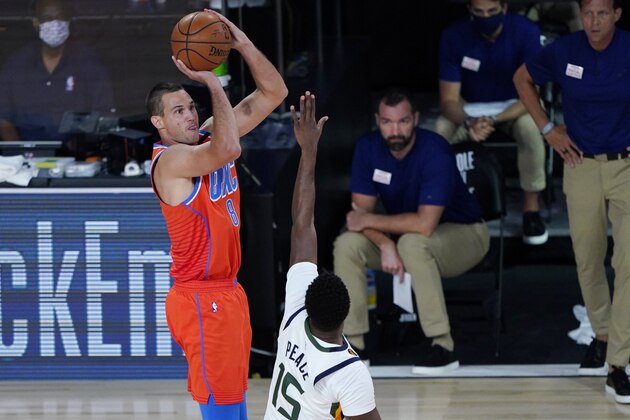 Oklahoma City Thunder's Danilo Gallinari (8) shoots over Utah Jazz's Emmanuel Mudiay (15) during the first half of an NBA basketball game Saturday, Aug. 1, 2020, in Lake Buena Vista, Fla. (AP Photo/Ashley Landis, Pool)