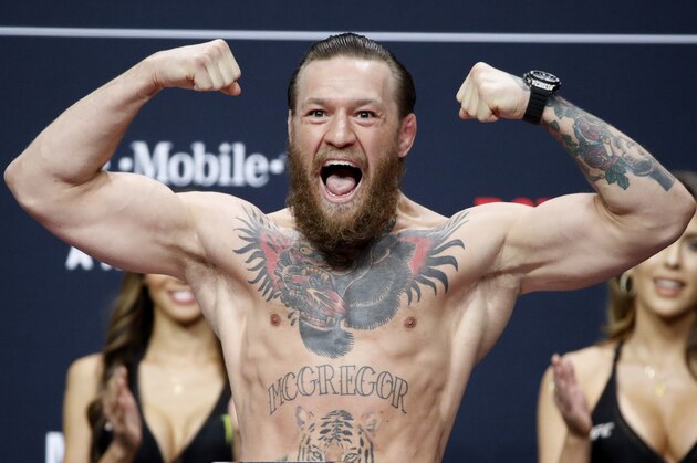 Conor McGregor poses during a ceremonial weigh-in for the UFC 246 mixed martial arts bout, Friday, Jan. 17, 2020, in Las Vegas. McGregor is scheduled to fight Donald