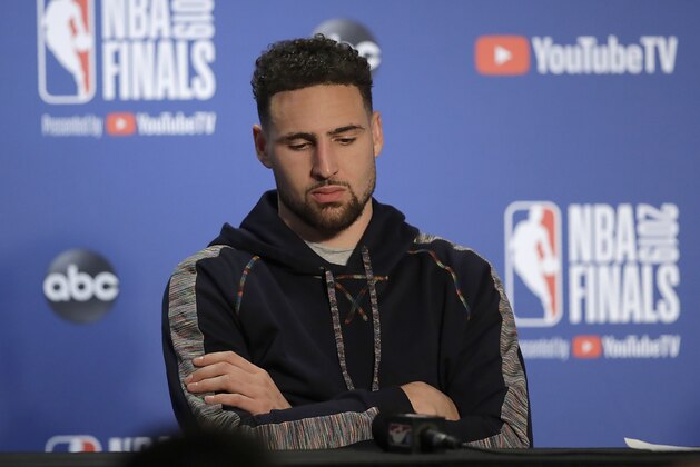 Golden State Warriors' Klay Thompson waits to speak during a media conference after Game 4 of basketball's NBA Finals against the Toronto Raptors Friday, June 7, 2019, in Oakland, Calif. (AP Photo/Ben Margot)