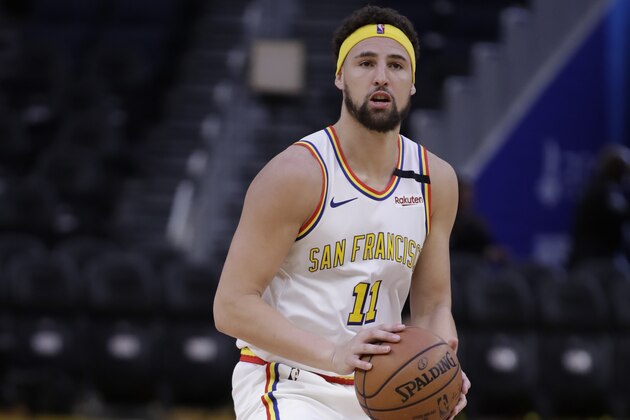 Golden State Warriors' Klay Thompson warms up prior to an NBA basketball game against the Denver Nuggets Thursday, Jan. 16, 2020, in San Francisco. (AP Photo/Ben Margot)