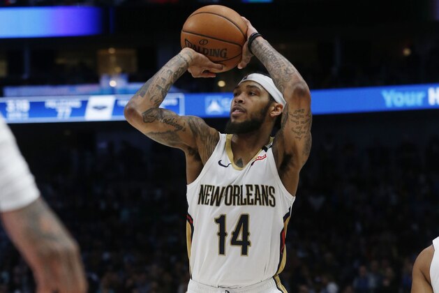New Orleans Pelicans forward Brandon Ingram shoots a 3-pointer against the Dallas Mavericks during the second half of an NBA basketball game in Dallas, Wednesday, March 4, 2020. (AP Photo/Michael Ainsworth)