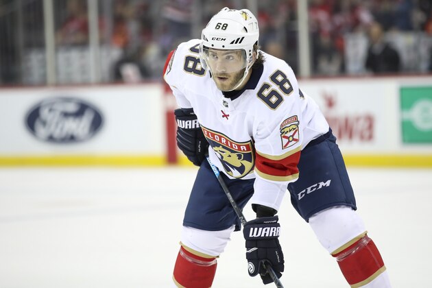 Florida Panthers center Mike Hoffman lines up for a face-off during the second period of an NHL hockey game against the New Jersey Devils, Monday, Oct. 14, 2019, in Newark, N.J. (AP Photo/Mary Altaffer)