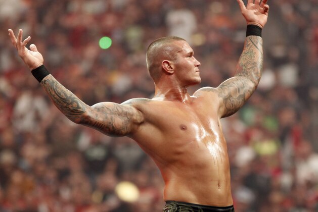 WWE Superstar Randy Orton celebrates victory during WrestleMania XXVI on March 28, 2010, at University of Phoenix Stadium in Glendale, Arizona. (AP Photo/Rick Scuteri)