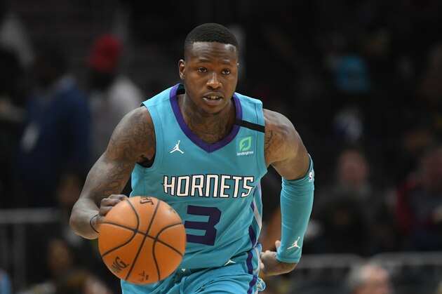 Charlotte Hornets guard Terry Rozier (3) brings the ball up the floor during an NBA basketball game against the Atlanta Hawks, Monday, March 9, 2020, in Atlanta. (AP Photo/John Amis)