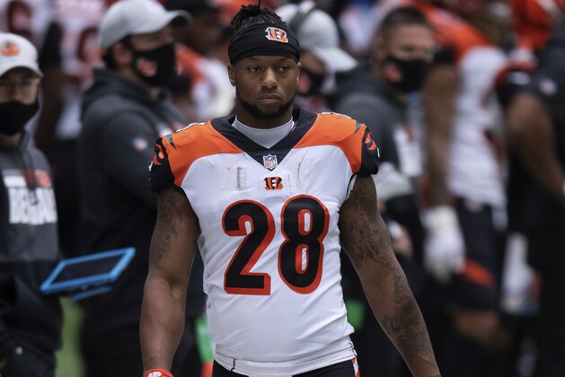 Cincinnati Bengals running back Joe Mixon (28) watches from the sidelines during an NFL football game between the Indianapolis Colts and Cincinnati Bengals, Sunday, Oct. 18, 2020, in Indianapolis. (AP Photo/Zach Bolinger)