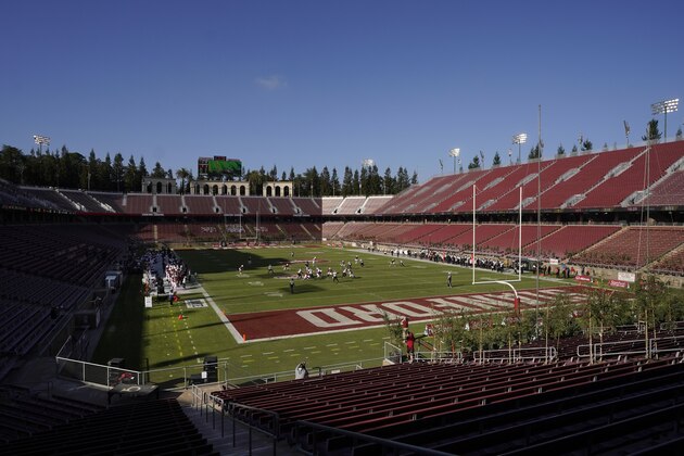 Empty seats at Stanford Stadium are shown during the first half of an NCAA college football game between Stanford and Colorado in Stanford, Calif., Saturday, Nov. 14, 2020. (AP Photo/Jeff Chiu)